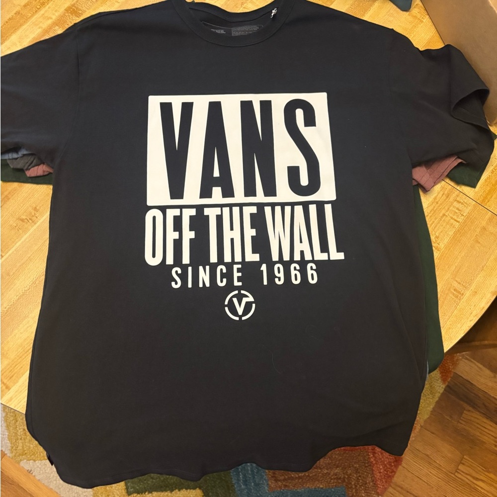 Five men’s medium T shirts.  Gently used. 2 Vans 2 RVCA 1 Volcom